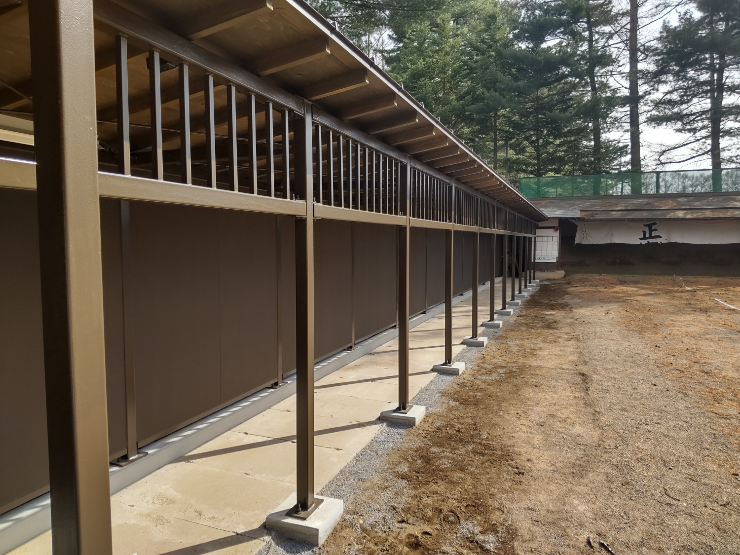 令和3年度　市単　公園管理事業　駒場公園弓道場（近的）塀改修工事